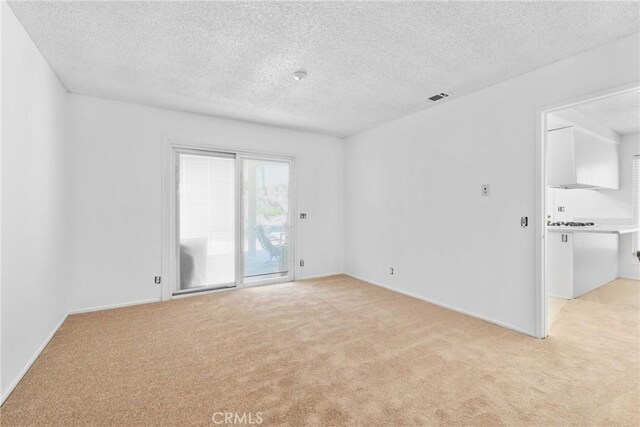 30369 Colina Verde St, Temecula, CA 92592 - carpeted spare room featuring a textured ceiling and baseboards