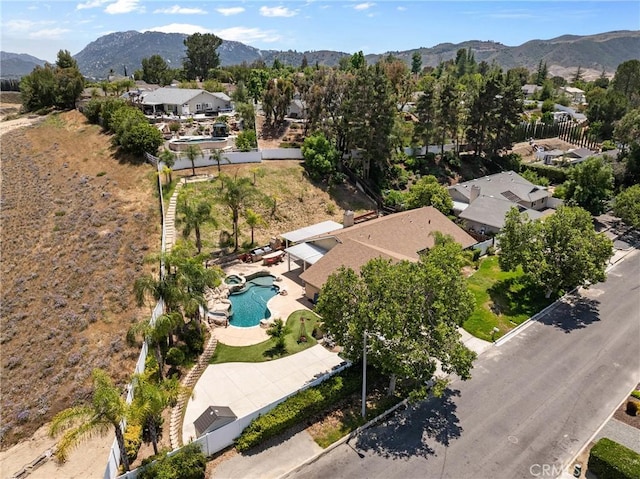 30369 Colina Verde St, Temecula, CA 92592 - aerial view of property and surrounding area with a pool area, a mountain backdrop, and nearby suburban area