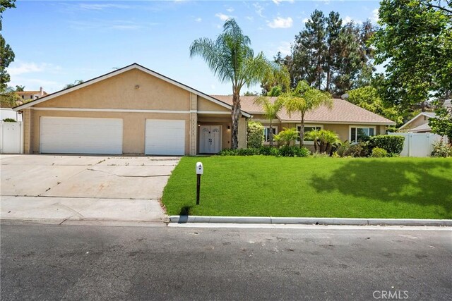 30369 Colina Verde St, Temecula, CA 92592 - ranch-style house with stucco siding, an attached garage, and concrete driveway