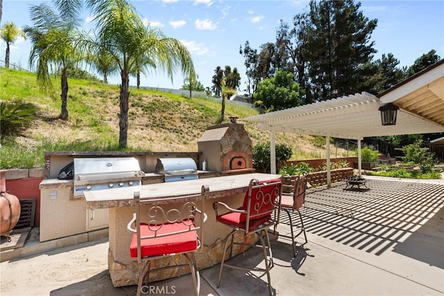 30369 Colina Verde St, Temecula, CA 92592 - view of patio with an outdoor bar and a pergola