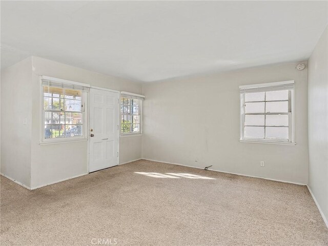 517 N Avon St, Burbank, CA 91505 - entryway featuring carpet and baseboards