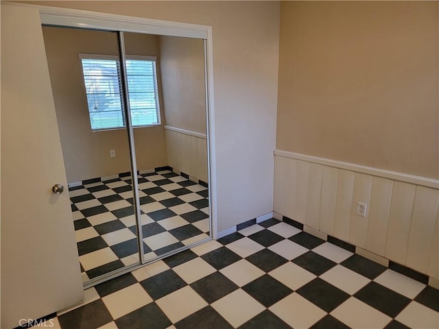 733 Piccadilly, Hemet, CA 92544 - spare room featuring wainscoting
