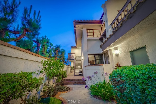 2209 W 25th St Unit 2, San Pedro, CA 90732 - view of exterior entry with stucco siding and a tile roof
