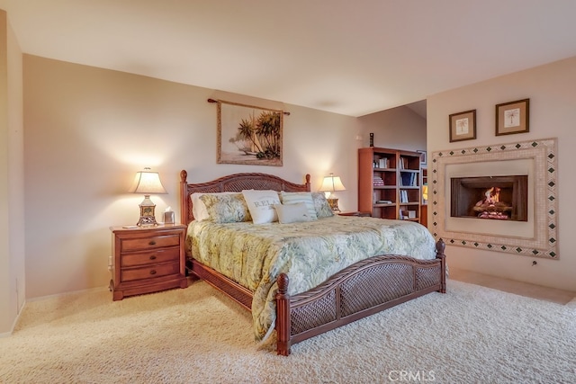 2209 W 25th St Unit 2, San Pedro, CA 90732 - bedroom with carpet floors and a warm lit fireplace