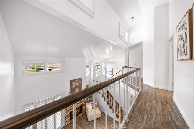 1665 Bridgeport, West Covina, CA 91791 - corridor with a chandelier, a towering ceiling, wood finished floors, and healthy amount of natural light