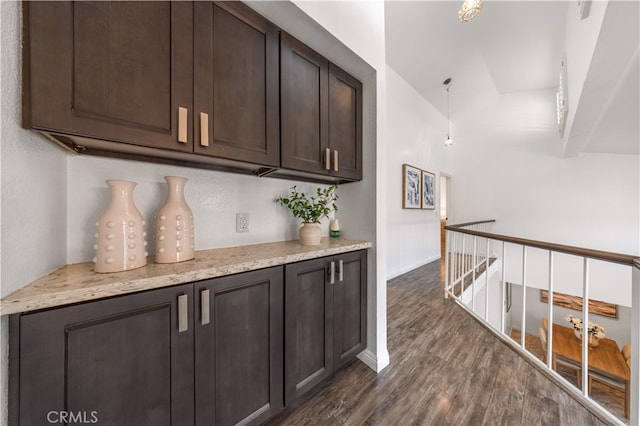 1665 Bridgeport, West Covina, CA 91791 - bar area featuring dark wood-type flooring and baseboards