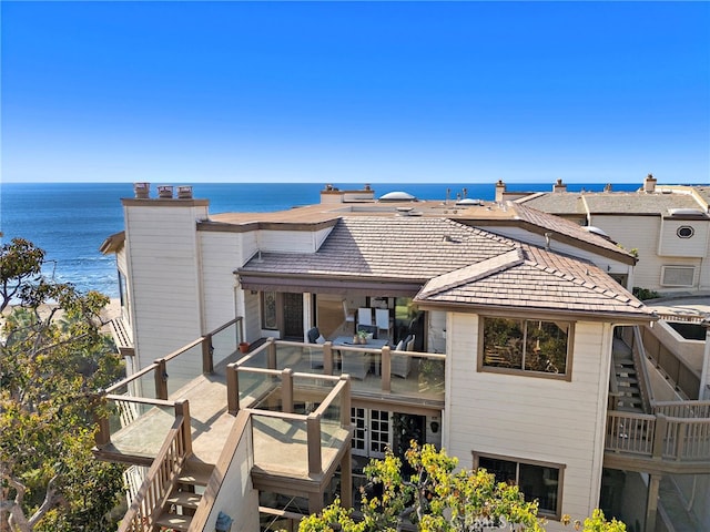408 Pasadena Ct Unit L, San Clemente, CA 92672 - rear view of property featuring a water view, a balcony, and a chimney