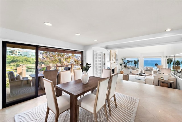 408 Pasadena Ct Unit L, San Clemente, CA 92672 - dining area featuring light tile patterned floors, healthy amount of natural light, recessed lighting, and a water view