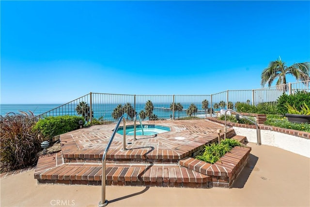 408 Pasadena Ct Unit L, San Clemente, CA 92672 - view of pool featuring a hot tub and a water view