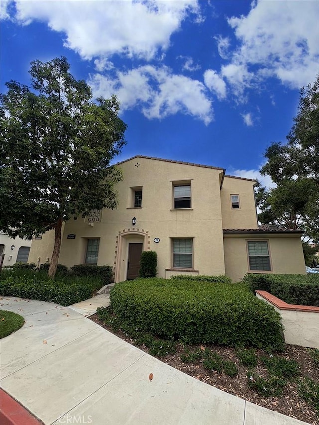 78 Talisman, Irvine, CA 92620 - view of front of home with stucco siding