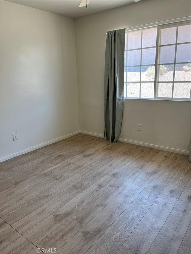 255 W Grace St, Barstow, CA 92311 - unfurnished room featuring wood finished floors and ceiling fan