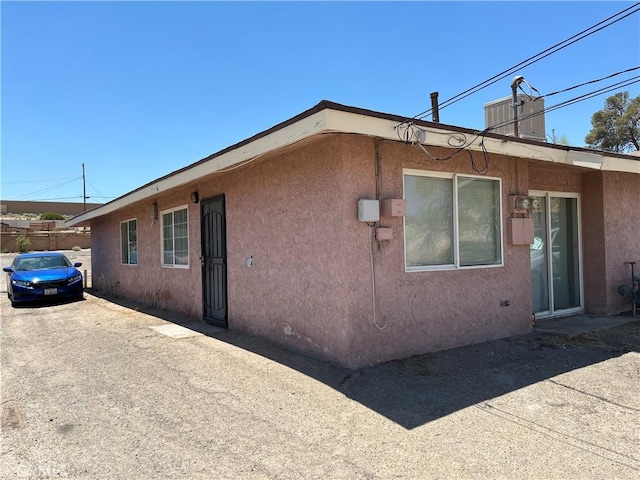 255 W Grace St, Barstow, CA 92311 - view of home's exterior featuring stucco siding