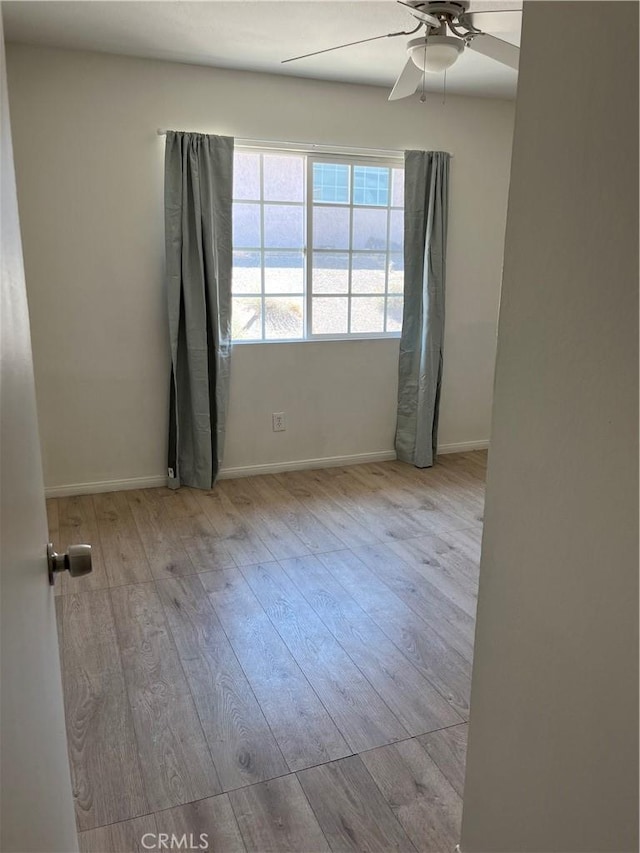 255 W Grace St, Barstow, CA 92311 - unfurnished room featuring wood finished floors and a ceiling fan