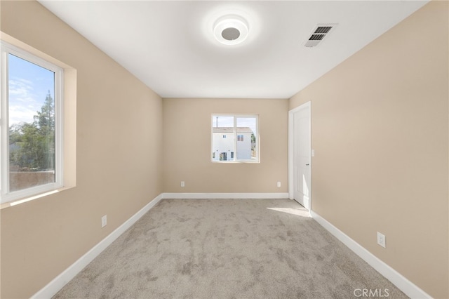 555 N Meridian Ave, San Bernardino, CA 92410 - carpeted empty room featuring baseboards