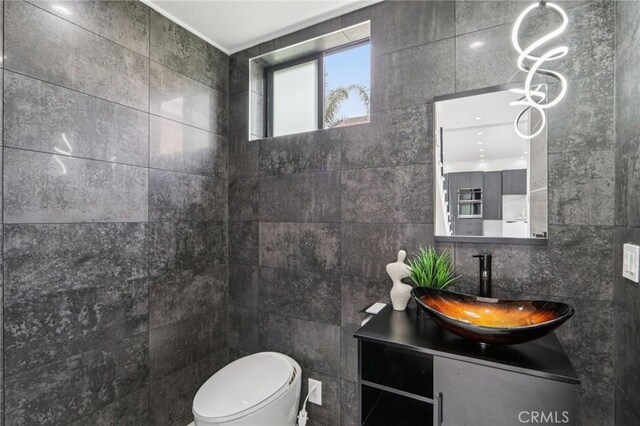 2227 N Lamer St, Burbank, CA 91504 - half bath with tile walls, toilet, and vanity