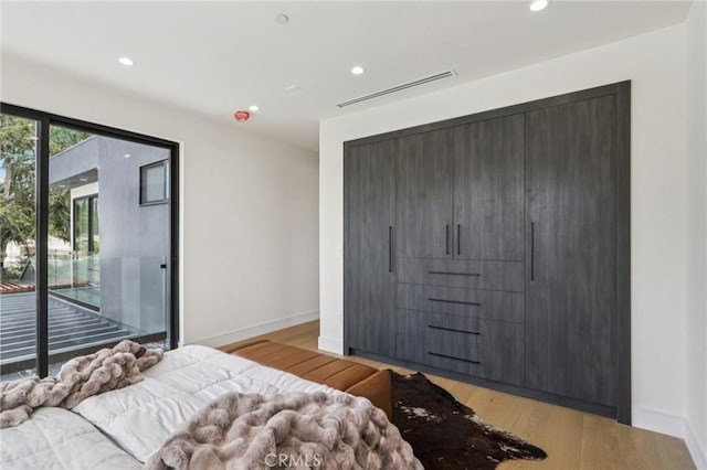2227 N Lamer St, Burbank, CA 91504 - bedroom featuring access to outside, recessed lighting, baseboards, and light wood-type flooring