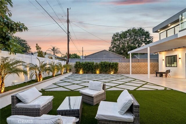 2227 N Lamer St, Burbank, CA 91504 - yard at dusk with a patio and an outdoor hangout area