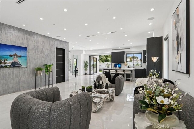 2227 N Lamer St, Burbank, CA 91504 - living area with recessed lighting and light marble finish floors