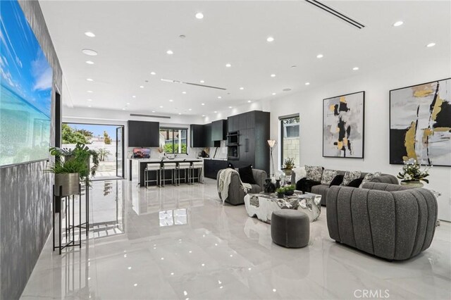 2227 N Lamer St, Burbank, CA 91504 - living area with recessed lighting and light marble finish flooring