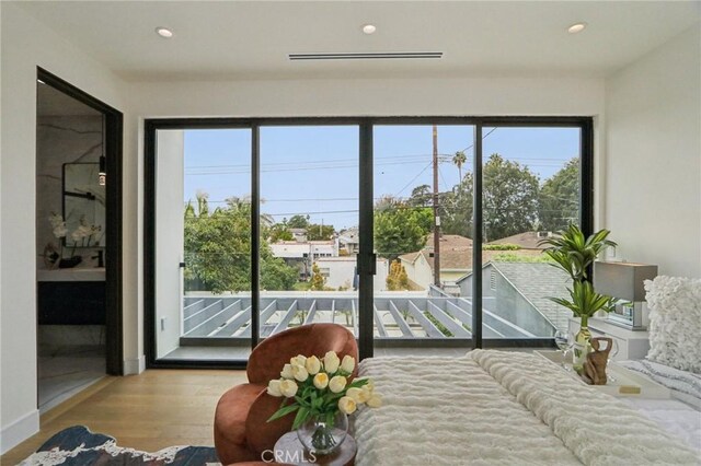2227 N Lamer St, Burbank, CA 91504 - living area with healthy amount of natural light, wood finished floors, and recessed lighting