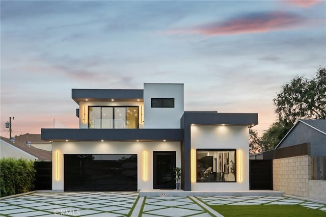 2227 N Lamer St, Burbank, CA 91504 - contemporary home with driveway, stucco siding, and an attached garage