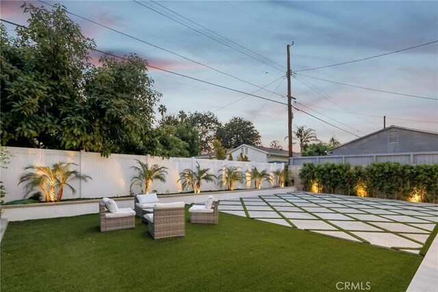 2227 N Lamer St, Burbank, CA 91504 - fenced backyard featuring an outdoor hangout area and a patio area