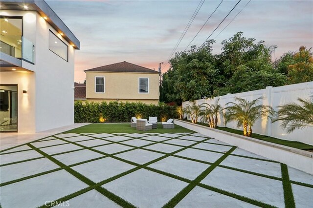 2227 N Lamer St, Burbank, CA 91504 - fenced backyard featuring outdoor lounge area and a patio area