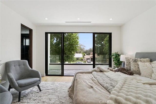 2227 N Lamer St, Burbank, CA 91504 - bedroom with wood finished floors, access to exterior, and recessed lighting