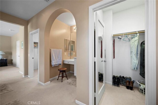 3262 Bluebird Cir, Simi Valley, CA 93063 - hallway featuring carpet and arched walkways