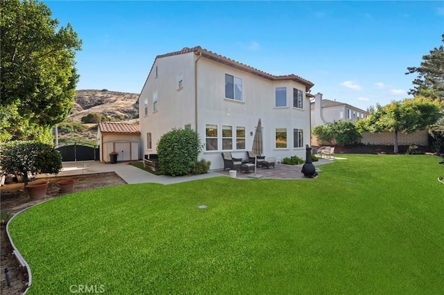 3262 Bluebird Cir, Simi Valley, CA 93063 - rear view of property with a patio, stucco siding, and a tile roof
