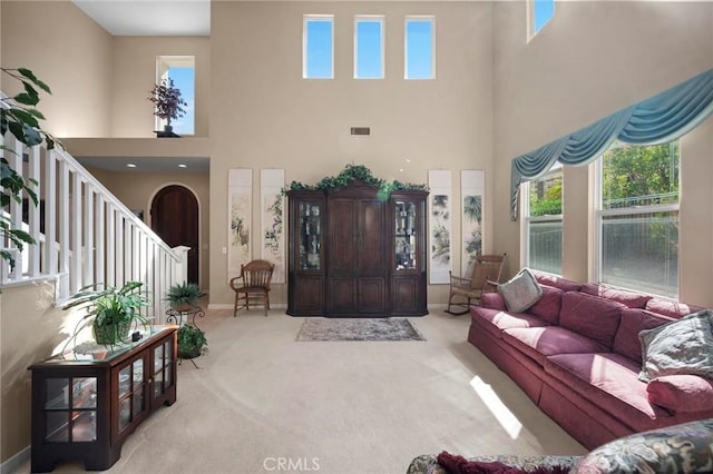 3262 Bluebird Cir, Simi Valley, CA 93063 - carpeted living room with a high ceiling and baseboards