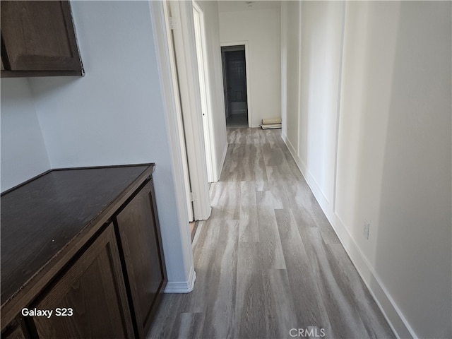 345 W Saint Andrews St, Ontario, CA 91762 - hallway featuring light wood-type flooring and baseboards