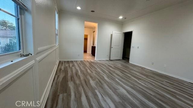 345 W Saint Andrews St, Ontario, CA 91762 - unfurnished bedroom with multiple windows, wood finished floors, and recessed lighting