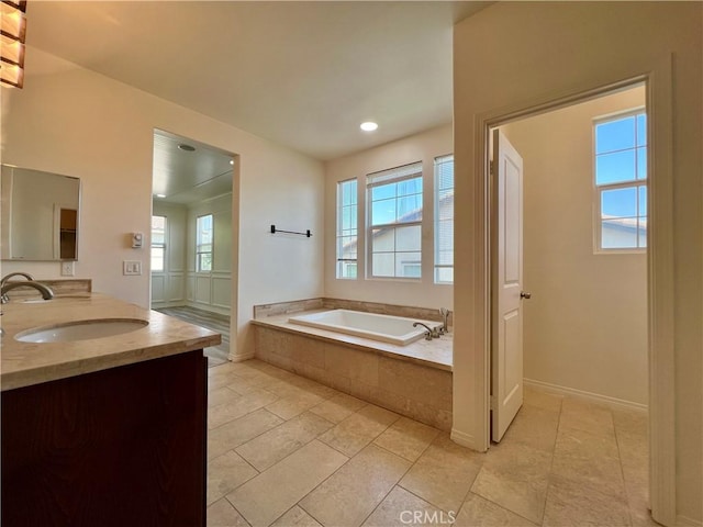 345 W Saint Andrews St, Ontario, CA 91762 - full bathroom with a bath, double vanity, recessed lighting, and tile patterned flooring