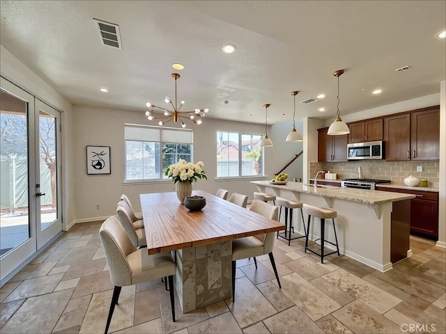 345 W Saint Andrews St, Ontario, CA 91762 - dining room featuring recessed lighting and a chandelier