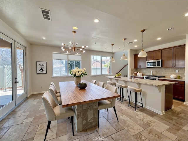 345 W Saint Andrews St, Ontario, CA 91762 - dining area with recessed lighting and a chandelier