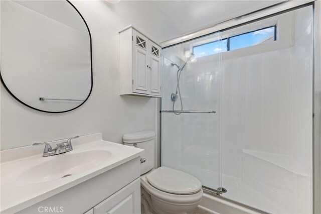 13115 Le Parc Unit 40, Chino Hills, CA 91709 - full bathroom featuring a shower stall, toilet, and vanity
