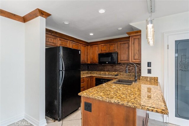13115 Le Parc Unit 40, Chino Hills, CA 91709 - kitchen with black appliances, a sink, a peninsula, brown cabinets, and recessed lighting