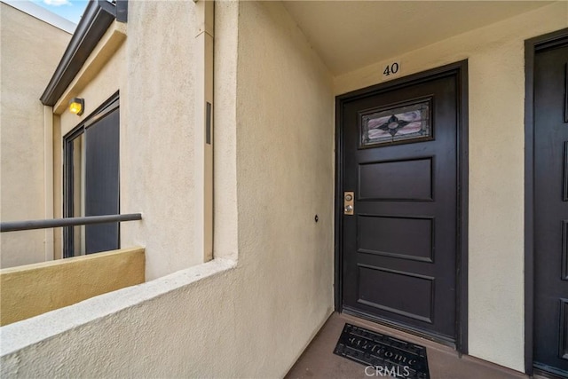 13115 Le Parc Unit 40, Chino Hills, CA 91709 - view of exterior entry featuring stucco siding