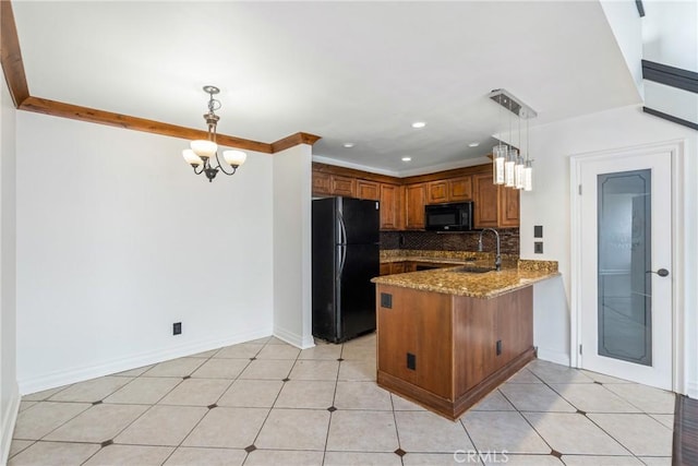 13115 Le Parc Unit 40, Chino Hills, CA 91709 - kitchen with black appliances, a peninsula, a chandelier, brown cabinets, and a sink