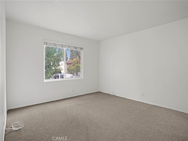 18411 Hatteras St Unit 122, Tarzana, CA 91356 - spare room featuring carpet and baseboards