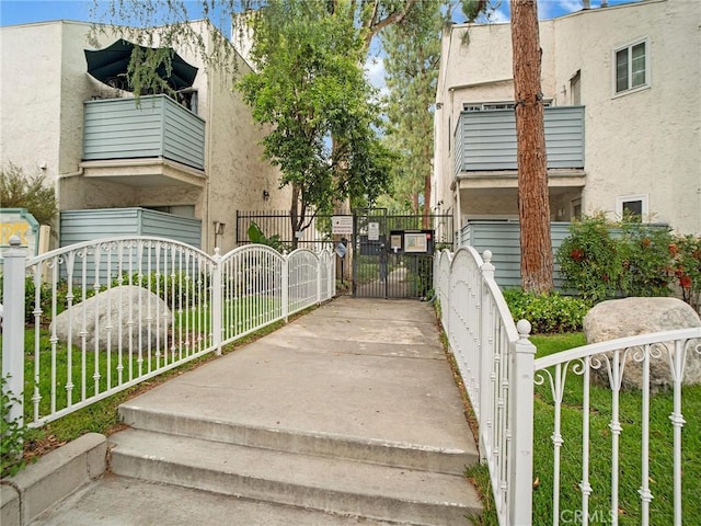 18411 Hatteras St Unit 122, Tarzana, CA 91356 - view of property's community with a gate