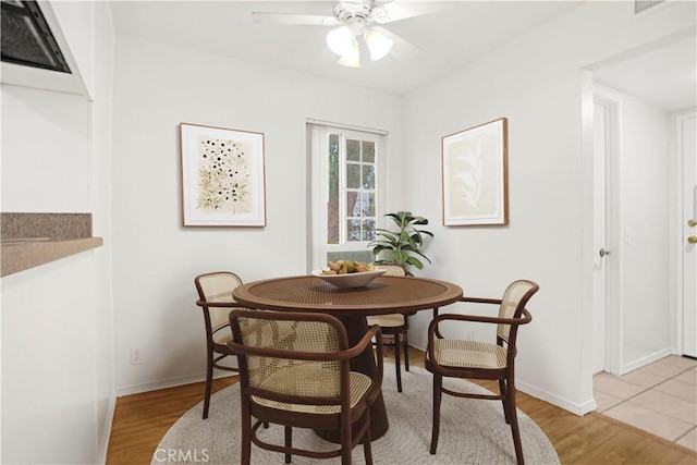 18411 Hatteras St Unit 122, Tarzana, CA 91356 - dining room with ceiling fan, light wood-type flooring, and baseboards