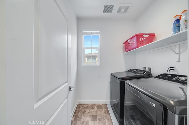 7452 Desert Holly St, Chino, CA 91708 - washroom featuring separate washer and dryer and baseboards