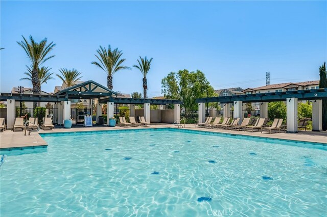 7452 Desert Holly St, Chino, CA 91708 - community pool with a patio