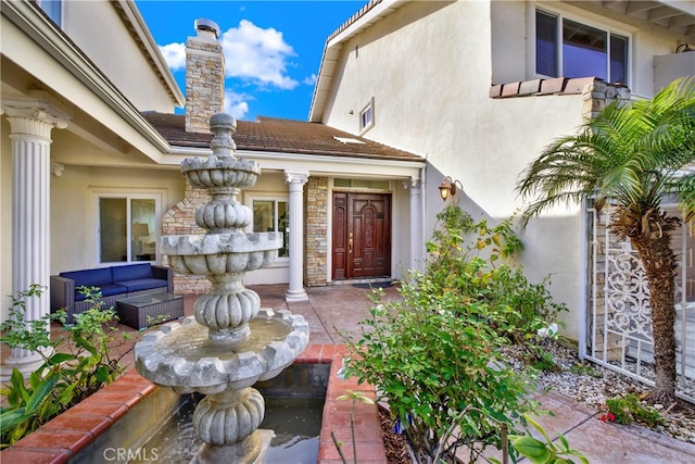 3313 Cabo Ct, Carlsbad, CA 92009 - view of exterior entry featuring stucco siding and a chimney