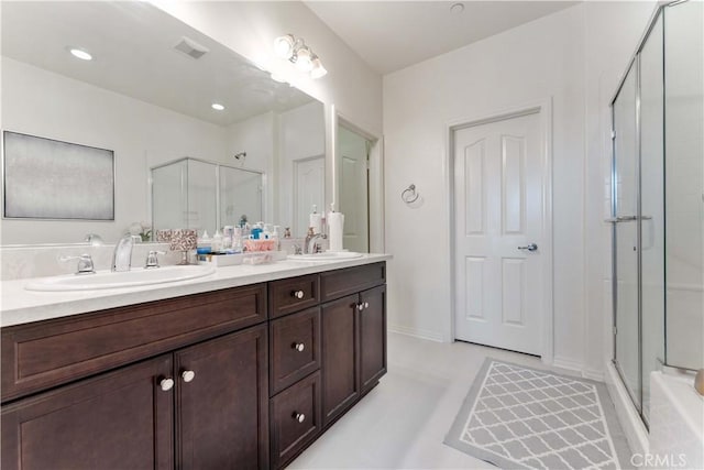 6045 Lyon St, Chino, CA 91710 - full bathroom featuring a shower stall and double vanity