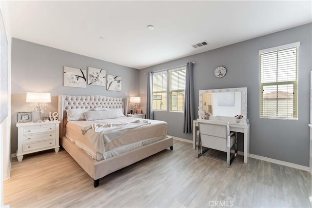 6045 Lyon St, Chino, CA 91710 - bedroom with light wood-type flooring and baseboards