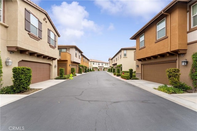 6045 Lyon St, Chino, CA 91710 - view of asphalt road with a residential view