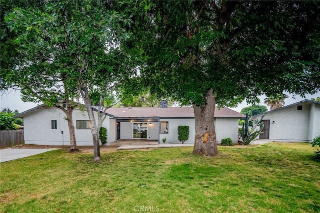 6367 Willow Ave, Rialto, CA 92377 - ranch-style house with a patio area, stucco siding, and a chimney